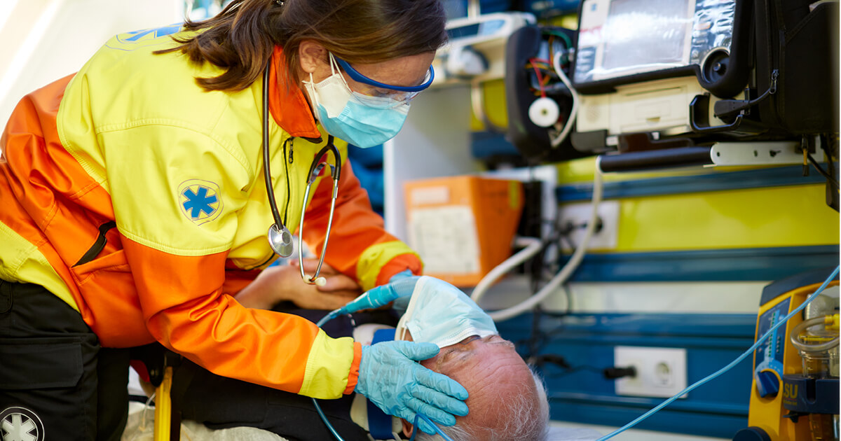paramedic_treating_patient_respiratory_event_resize paramedic_treating_patient_respiratory_event_resize